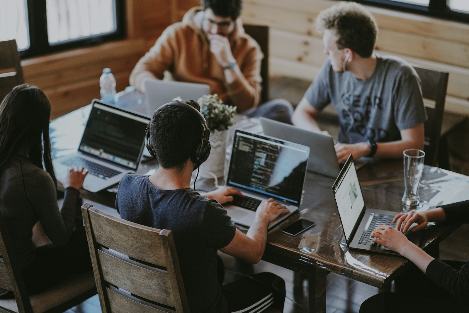 Developer working with laptop in a modern office